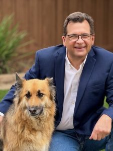 Jim Castleberry with his dog Kona